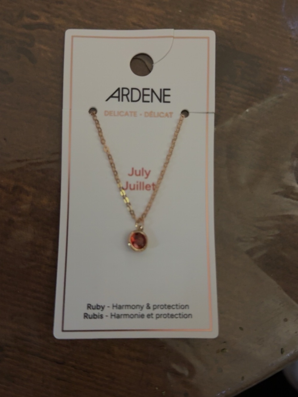 Ardene Gold-Tone Necklace with Red Ruby-Colored Pendant